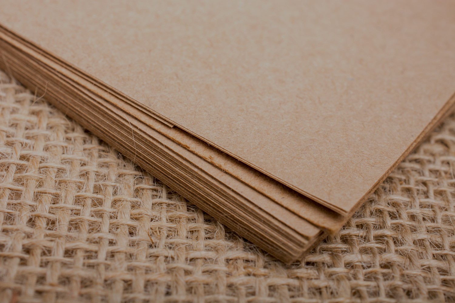 Brown color notebook on linen canvas
